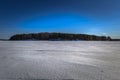 Falun - March 31, 2018: Panorama of the frozen lake of Framby Udde near the town of Falun in Dalarna, Sweden Royalty Free Stock Photo