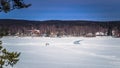 Falun - March 30, 2018: Panorama of the frozen lake at the resort of Framby Udde near the town of Falun in Dalarna, Sweden