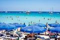 Famagusta District, Cyprus - June 20, 2019: People relaxing and sunbathing at Konnos beach