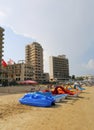 Abandoned and Damaged Buildings, National Flags and Colorful Rental Pedal boats in Varosha, Famagusta, North Cyprus Royalty Free Stock Photo