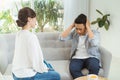 Famale psychiatrist listening to her patient who experienced traumatic events