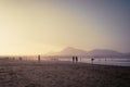 Famara Beach, Lanzarote, Canary Islands. Sunset on the beach, silhouettes of people