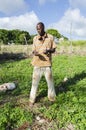 Farmer Sharpening A Knife