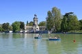 Families enjoy rowing on Great Basin in Retiro Park in Madrid, Spain.