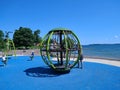 Families enjoying a playground at the beach