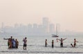 Families enjoying the sea, Chowpatty Beach, Mumbai, India