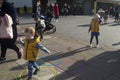 Families with kids playing on an art installation outside the Royal Festival Hall in South bank