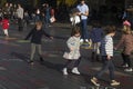 Families with kids playing on an art installation outside the Royal Festival Hall in South bank