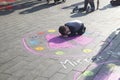 Families with kids playing on an art installation outside the Royal Festival Hall in South bank