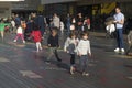 Families with kids playing on an art installation outside the Royal Festival Hall in South bank