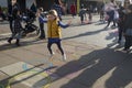 Families with kids playing on an art installation outside the Royal Festival Hall in South bank