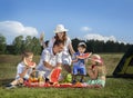 Families picnic outdoors