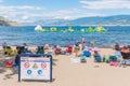 Families play on the inflatable Wibit course on Okanagan Lake