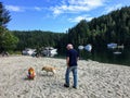 Families walking along the beach in Tod Inlet, a popular bay for people from Brentwood Bay