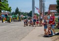 Families watch a parade on the 4th of July