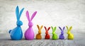 Familiy of colorful porcelain easter rabbits Royalty Free Stock Photo