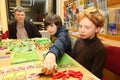 Familiy playing board game Royalty Free Stock Photo