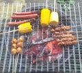 Familiy time,, sate, grilled sausage, grilled corn and grilled meatballs