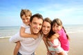 Familly standing on the beach Royalty Free Stock Photo