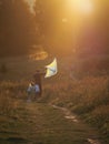 The family launches a kite in the park