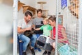 Family adopting cat from animal shelter Royalty Free Stock Photo