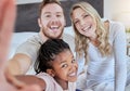 Family, adoption and selfie portrait, love and smile together on bed in the morning, support and happy in home. Black