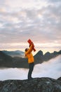 Family adventure vacation mother holding up baby in mountains Royalty Free Stock Photo