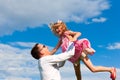 Family affairs - father and daughter playing in su Royalty Free Stock Photo