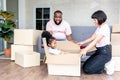 Family, African American father, Asian mother and 5-year-old daughter, they are happy together From moving or relocation to a new Royalty Free Stock Photo