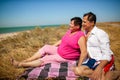 family, age and people concept - happy senior couple holding hands talking outdoors Royalty Free Stock Photo