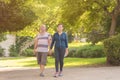 Family, age, sport, healthy and people concept - happy senior couple holding hands and exercising together. Royalty Free Stock Photo