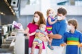 Family in airport in face mask. Virus outbreak