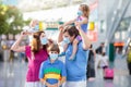 Family in airport in face mask. Virus outbreak Royalty Free Stock Photo