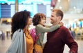 Family at airport, travel and hug with vacation, mother and father with child, ready for flight and adventure. Terminal Royalty Free Stock Photo