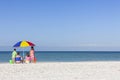 Family Alone on Beach With Umbrella Royalty Free Stock Photo