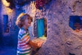 Family in aquarium. Kids watch fish, marine life Royalty Free Stock Photo