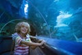 Family in aquarium. Kids watch fish, marine life Royalty Free Stock Photo