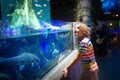 Family in aquarium. Kids watch fish, marine life Royalty Free Stock Photo