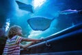 Family in aquarium. Kids watch fish, marine life Royalty Free Stock Photo