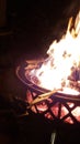 Family around the firepit  watching the fire Royalty Free Stock Photo