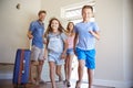 Family Arriving At Summer Vacation Rental Royalty Free Stock Photo