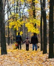 Family in autumn forest Royalty Free Stock Photo