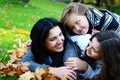 Family in autumn park Royalty Free Stock Photo