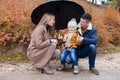 Family autumn in the Park in the rain umbrella Royalty Free Stock Photo