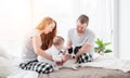 Family with dog in the bed Royalty Free Stock Photo