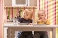 Family baby brother and sister play eat meal in toy kitchen Royalty Free Stock Photo