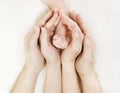 Family Baby hands, Newborn Kid hand into Mother Father Parents hands Royalty Free Stock Photo