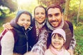 Family with backpacks taking selfie and hiking Royalty Free Stock Photo