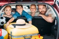 family on backseats of car ready Royalty Free Stock Photo