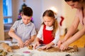 Family baking Christmas cookies